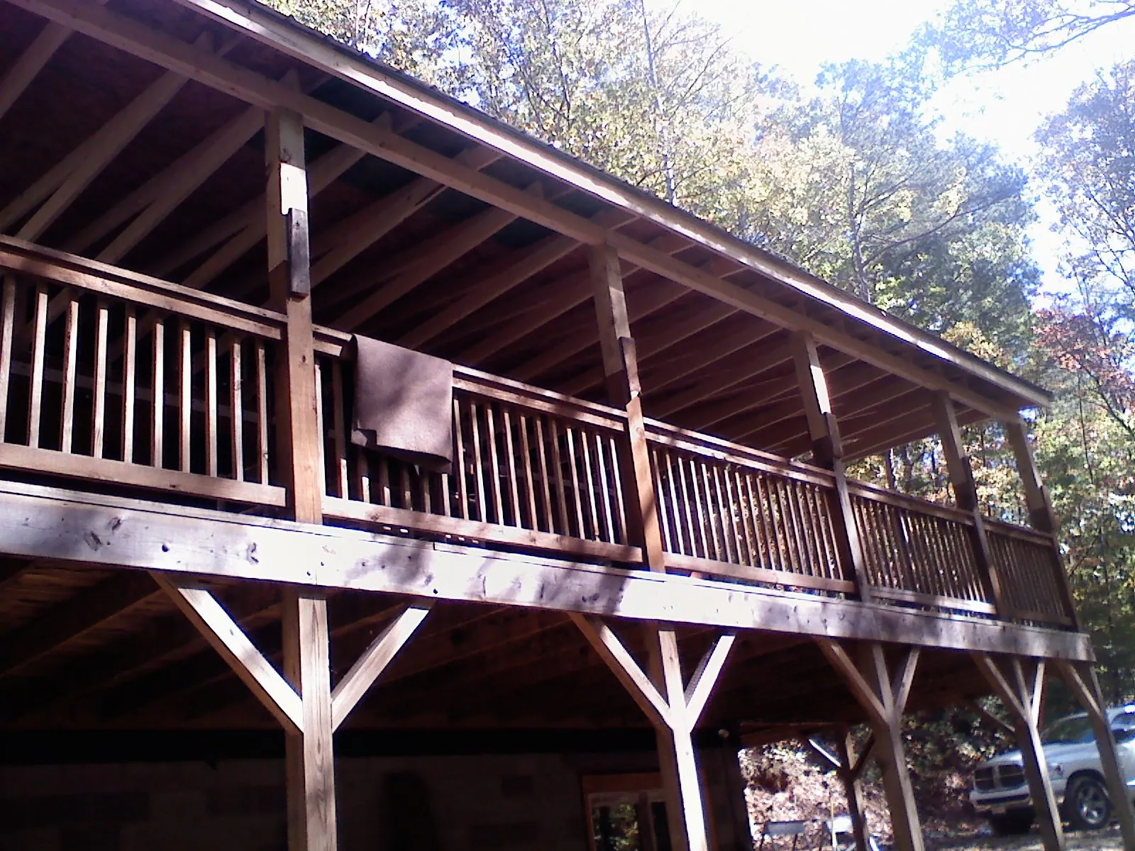 Timber framing under a new elevated porch and deck — Roof Leak Repair in Pacific Grove by Roofing Brothers